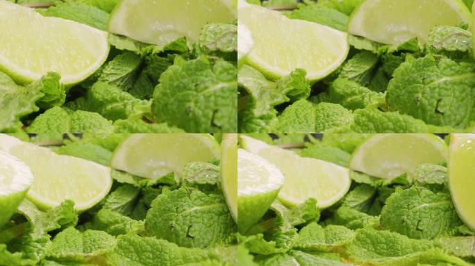 绿薄荷和酸橙柠檬柠檬汁成分探头镜头微距特写，绿叶鲜香薄荷与水滴特写。