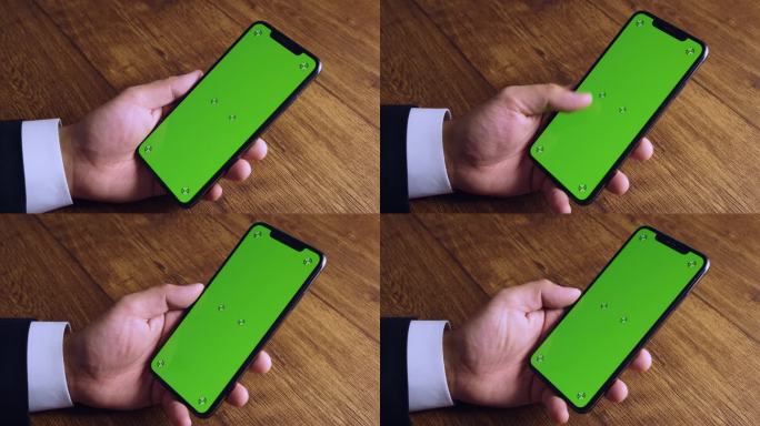 绿色模拟屏幕智能手机特写镜头