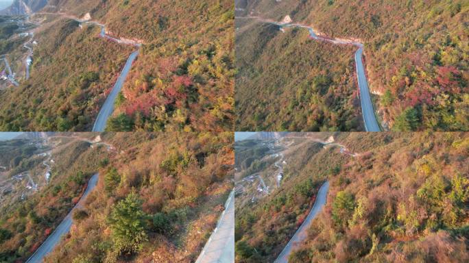 4K秋天山峰秋意盎然公路风景航拍视频