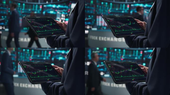 一个匿名的人拿着一台平板电脑，屏幕上有股票市场分析、图表和报告。证券交易所应用模板。监测金融和商业机