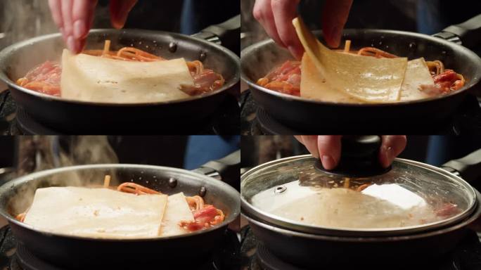 厨师烹饪番茄意式肉酱新鲜的番茄酱意面，厨师在餐厅厨房制作传统的意大利晚餐，美味佳肴