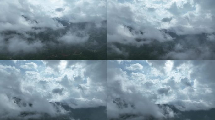 无人机航拍穿云高空云雾缭绕山脉圣堂山