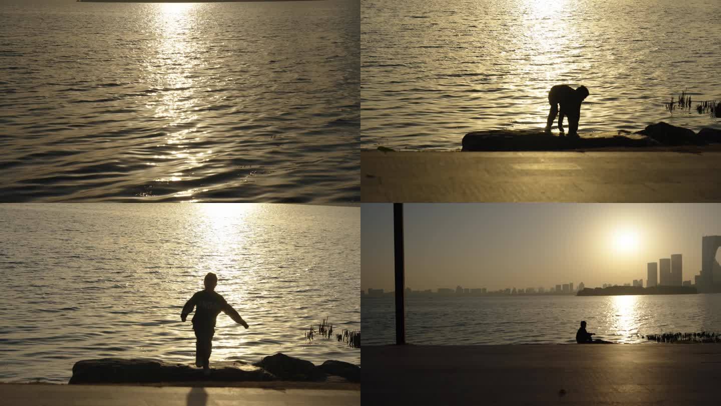 (4k原创)一个小孩湖边玩耍 夕阳 湖边