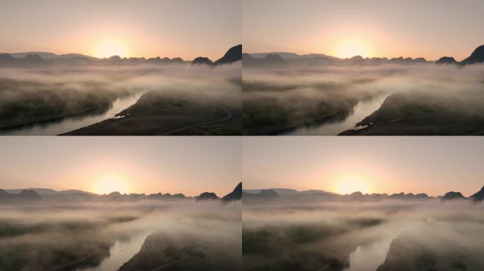 日出时分桂林漓江两岸的上空的云雾缭绕