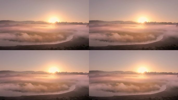 日出时分桂林漓江两岸的上空的云雾缭绕