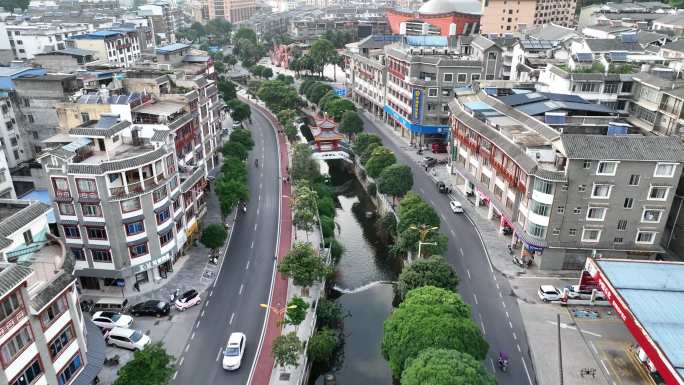 航拍广西来宾金秀县城沿金秀河两岸街道