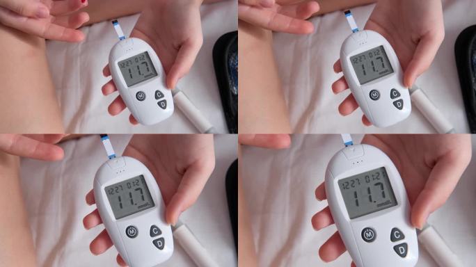 糖尿病检查血糖水平。儿童在家中使用血点滴和血糖仪