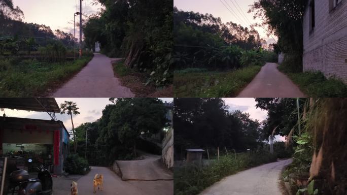 落日霞光行驶山路乡道傍晚村庄道路