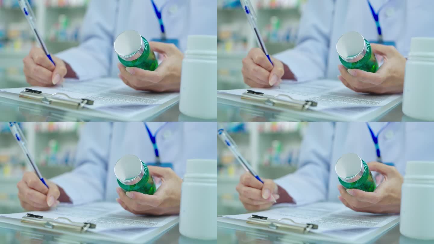 特写女药剂师在纸上手写药品细节。