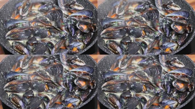 用黑锅烹制的地中海贻贝。