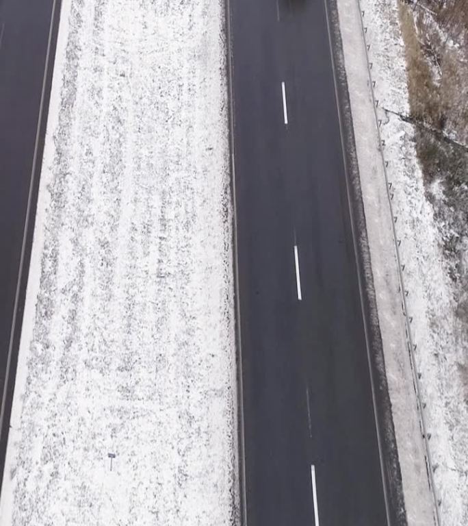 垂直空中雪路冬季景观图钉