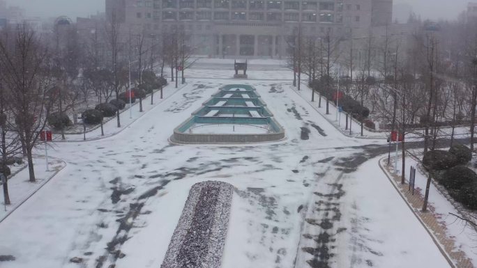 航拍东财东北财经大学雪下雪雪天雪景