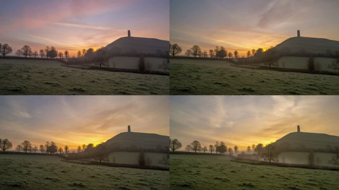 日出时雾气接近相机，延时拍摄于英国萨默塞特格拉斯顿伯里