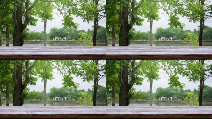 4K视频空木桌面与模糊的绿色树在公园散景光背景，背景模板显示的产品展台