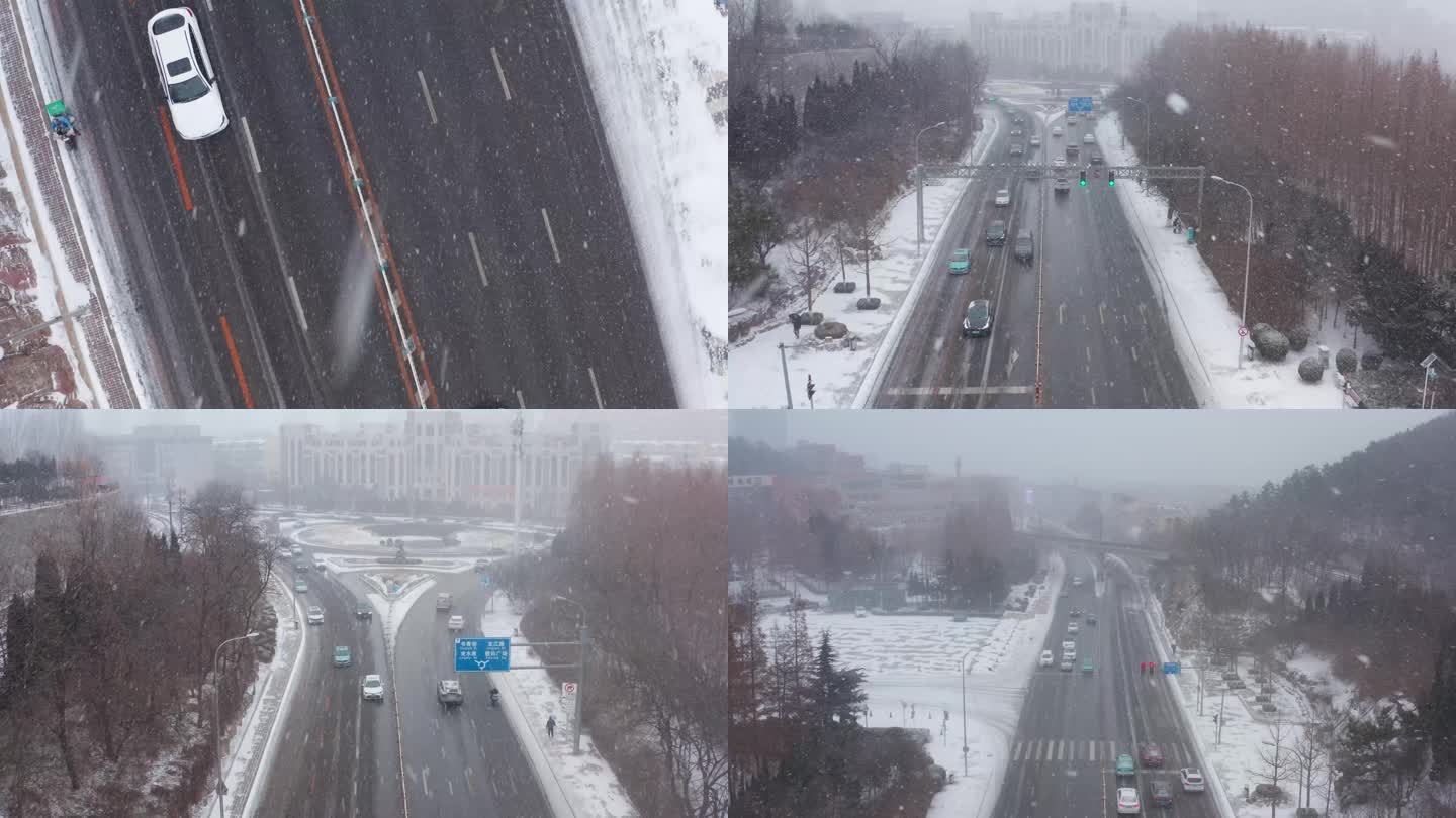 航拍道路车辆交通雪景下雪雪天雪景数码广场