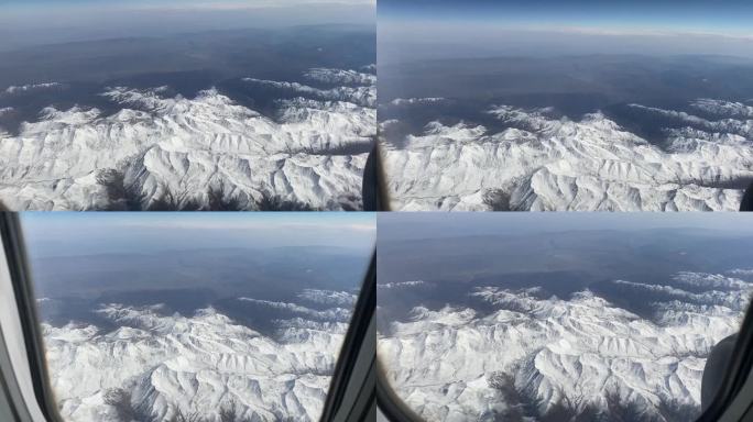 飞机窗外的风景/机场窗外/雪山