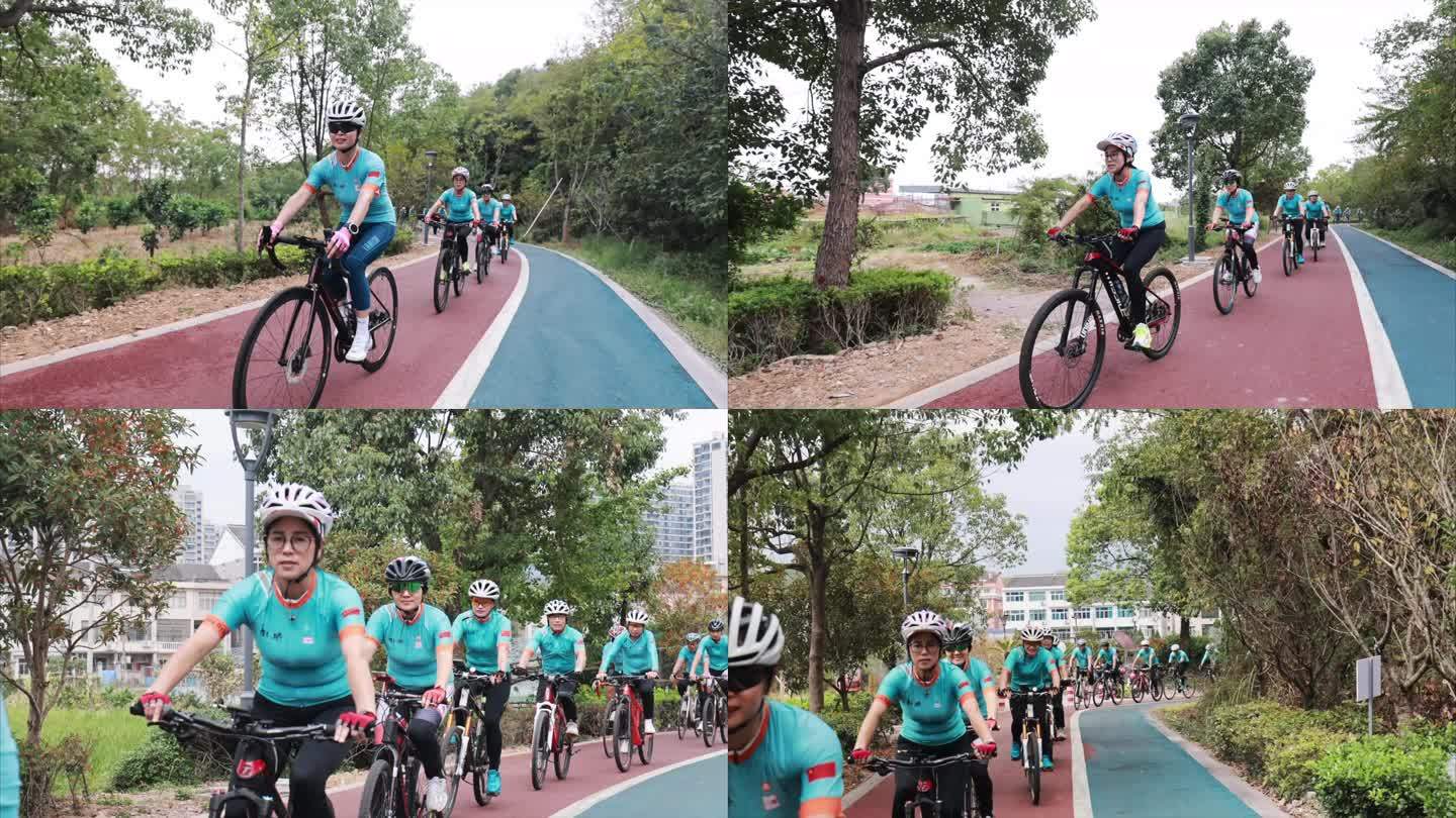 自行车队在公园绿道里骑行
