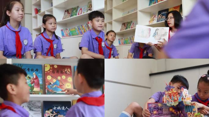志愿者在图书阅览室给小朋友讲红船的故事
