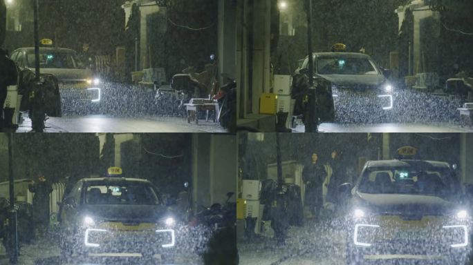 夜晚下雪北京雪夜出租车