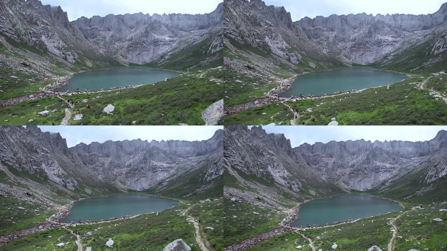 航拍四川阿坝州旅游莲宝叶则石头山高原湖泊