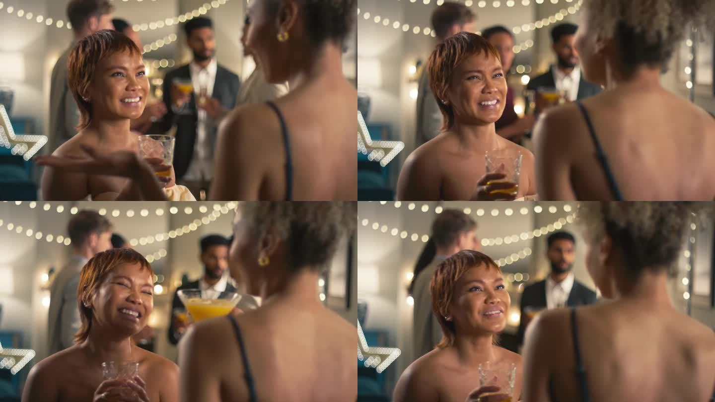 一个女人在派对上一边和女性朋友聊天一边喝鸡尾酒的照片