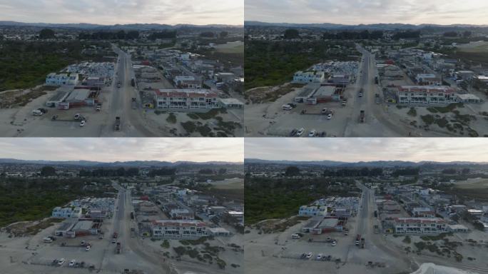 空中无人机拍摄的皮斯莫海滩加州机场和城镇在日出