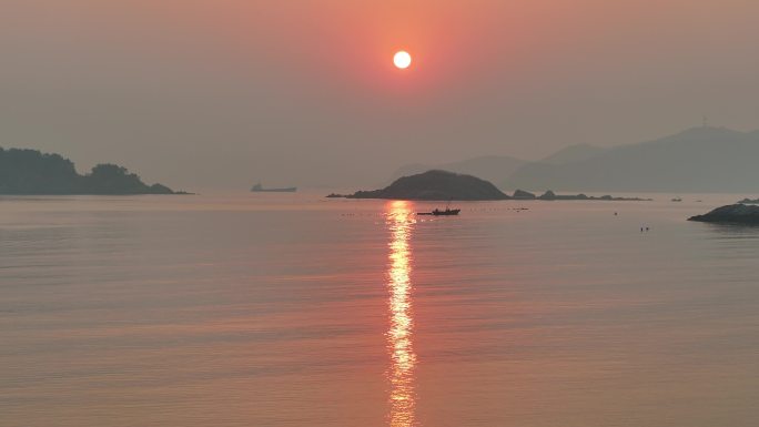 威海半月湾日出朝霞