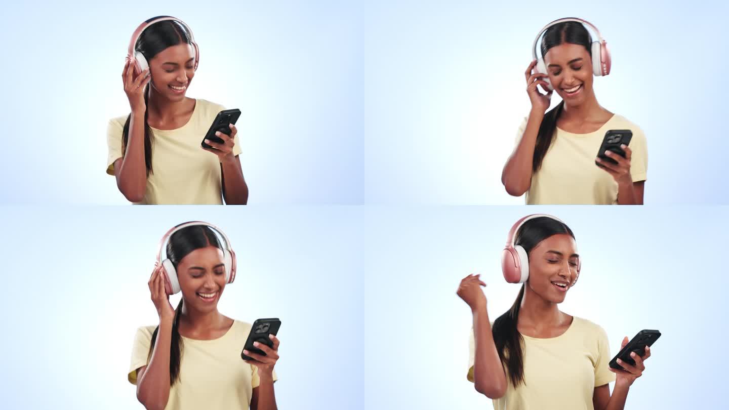 快乐的女人，耳机和手机随着音乐、播客或歌曲在蓝色背景下跳舞。女性微笑着听着移动智能手机的音频流、音轨