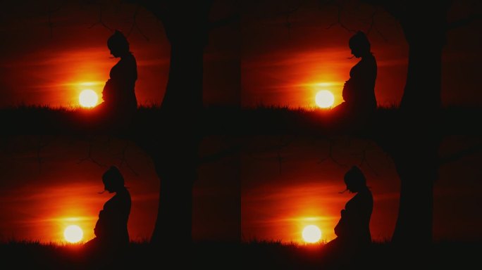 慢镜头:太阳在农村孕妇的剪影后面升起