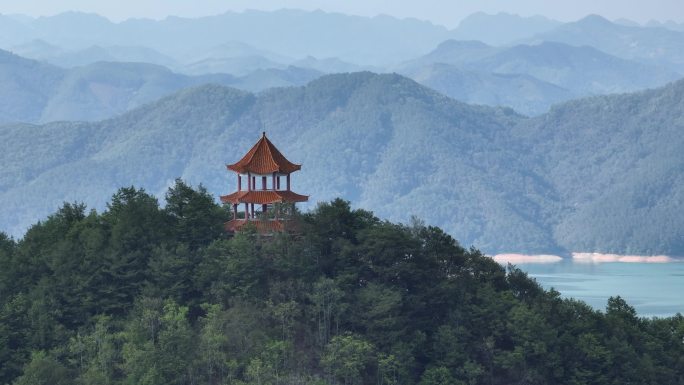 航拍水库湖边山顶小塔旅游景点百色雄风塔