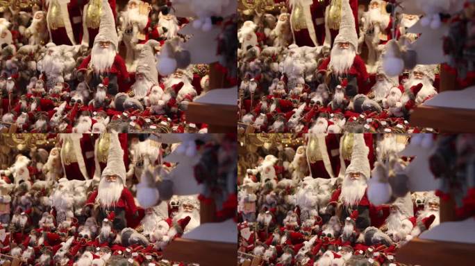 在欧洲的一个圣诞集市上，商店里陈列着一排排的圣诞老人雕像
