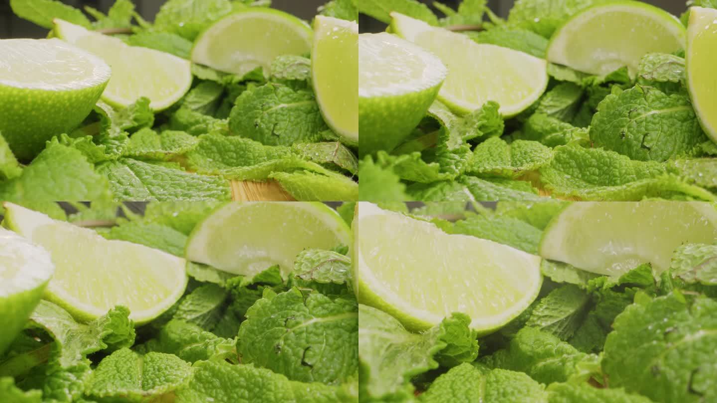 绿薄荷和酸橙柠檬柠檬汁成分探头镜头微距特写，绿叶鲜香薄荷与水滴特写。
