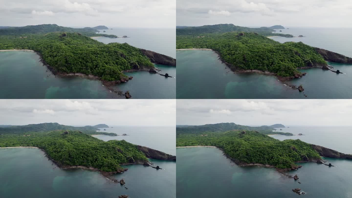 这是一幅4K无人机拍摄的蓬塔萨巴纳角和米拉多孔查尔半岛，旁边是别霍港和普拉亚孔查尔，或称“贝壳海滩”