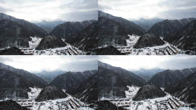 航拍冬天湖北旅游神农架户外山谷村庄雪景