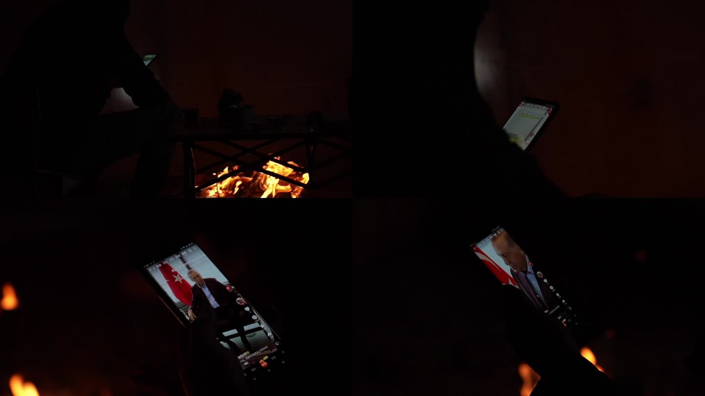 压力大男子烤篝火，刷手机视频
