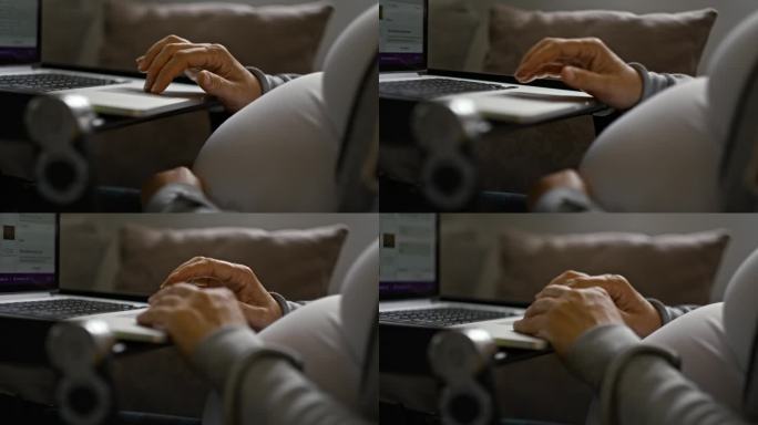 近距离孕妇在家用笔记本电脑工作