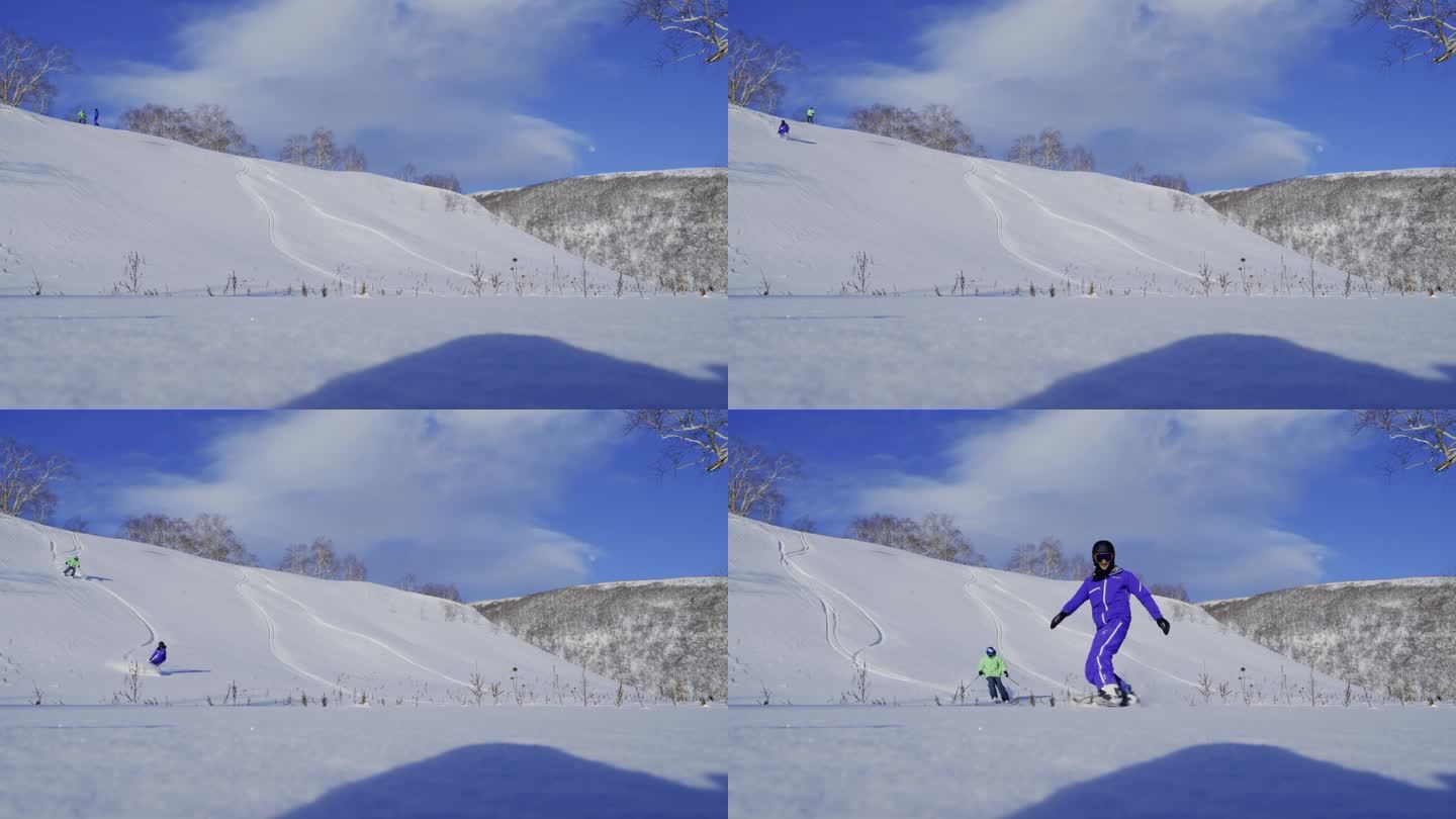 两个人从雪坡高处滑雪下落到摄像机