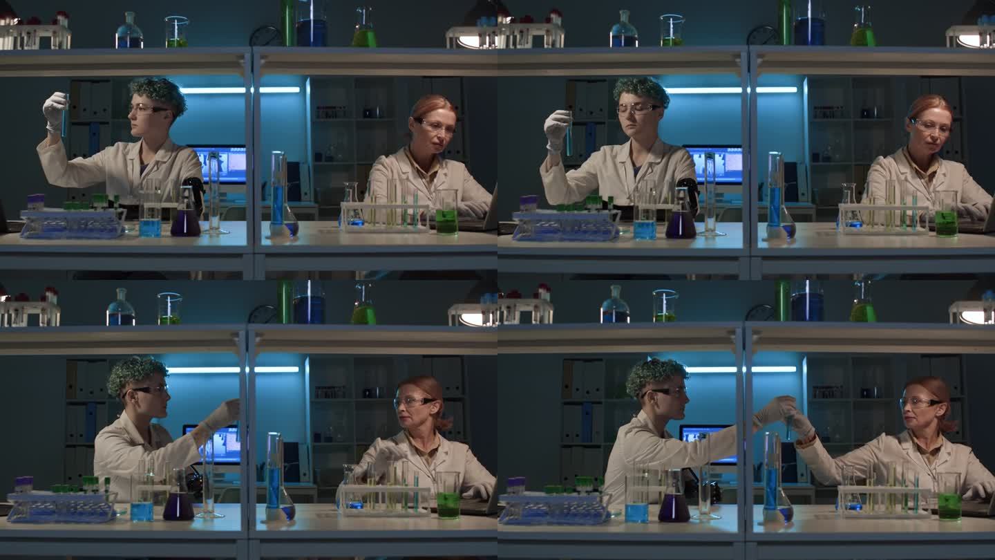 两个不同的白人女性研究人员在实验室一起工作