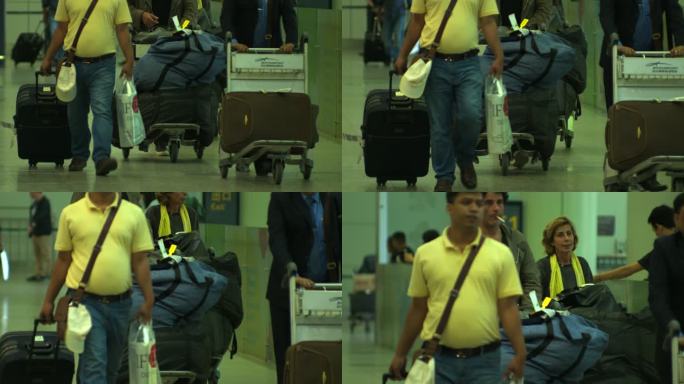 国外旅客推行李出机场