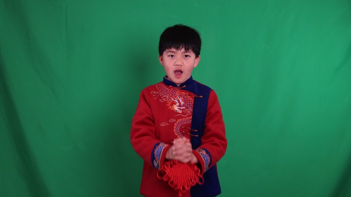 中国小男孩恭贺新年拜年慢镜绿幕抠像