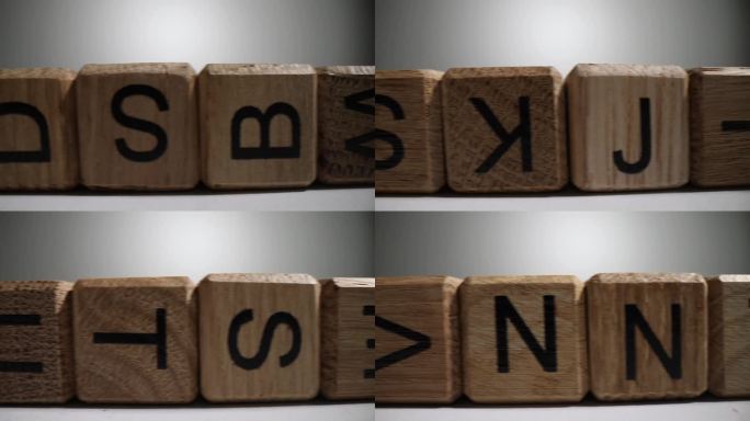 用英文字母排成一排的木块