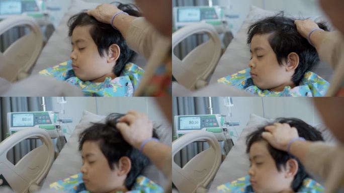 一位可爱的祖母抚摸着躺在医院病床上的小孩的头。她表达了她的爱，并希望他早日康复。