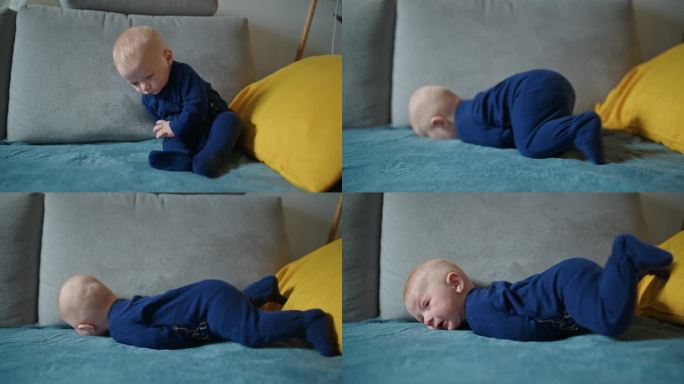 穿着蓝色天鹅绒紧身衣的可爱小男孩倒在家里的沙发上