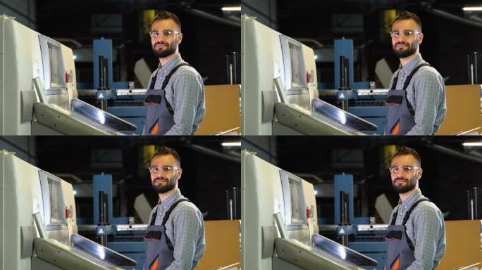 现代胶印机旁的技术操作员肖像。