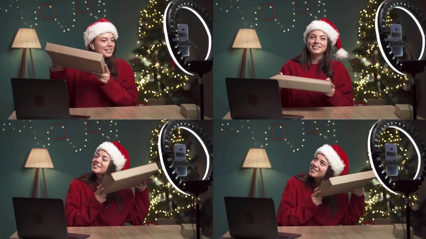 社交媒体上有影响力的人录制了一段视频，为圣诞节在家打开一款科技产品的包装盒。博主为关注者评论产品