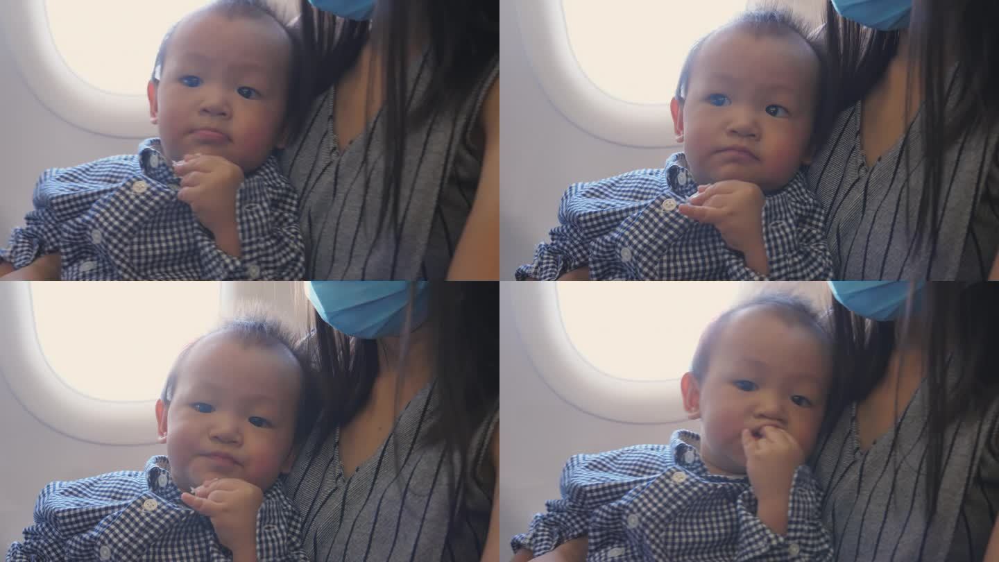 空中时光:亚洲母亲在旅行中用爱养育儿子。