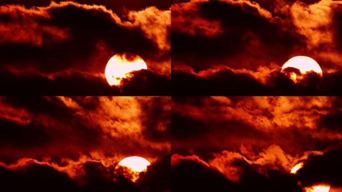 红色史诗般的日落穿过暗黄橙云，电影般的天际线。