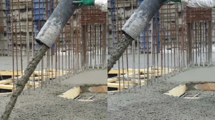 在建筑工地用管道浇筑混凝土的铁栅栏或地面钢筋