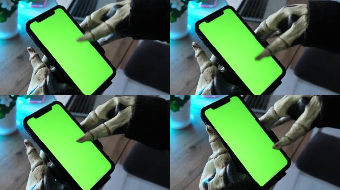 可怕的瘦骨嶙峋的手和瘦骨嶙峋的手指触摸着屏幕，用智能手机触摸着屏幕。