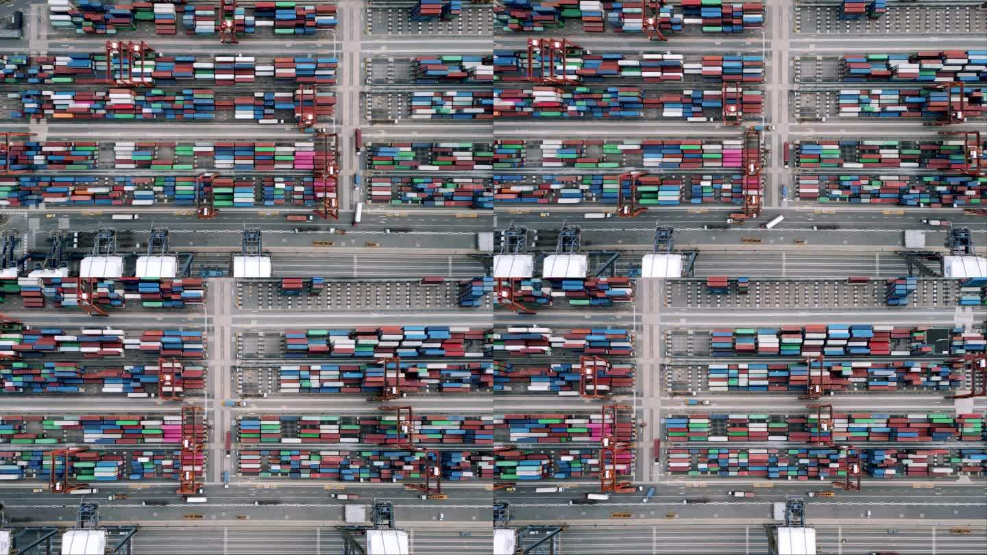 货物运输、港口运输及集装箱运输。工业船厂产品箱装载的概念。香港工作码头的高空运输全景图